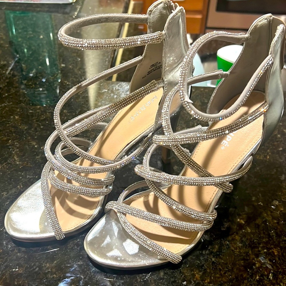 Strap high heels with lots of bling